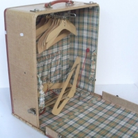 PACKHARD Ladies travelling suitcase with fold down front and wooden coat hangers on hanging rack to interior, leather edging - Sold for $98 - 2013