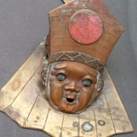 2 x vintage paper holders - novelty brass fan shaped with Oriental boy with hat & rolling eyes & another - Sold for $61 - 2013