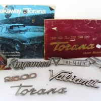 Lot of 7 x car badges and insignia & 2 x Torana manuals - Sold for $55 - 2013