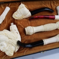 Boxed set of ornate carved Meerschaum pipes and stems - Sold for $159 - 2013