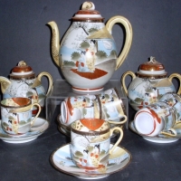 Very fine  Japanese porcelain coffee set  (pot, jug, basin, 6 x cups & saucers)  -  handpainted scene including figures, water, house etc (cup  - Sold for $85 - 2013