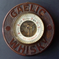 GAELIC WHISKY Advertising Barometer - Carved wooden surround w text + 'OLD SMUGGLER' to Face, cracked original glass, otherwise v g cond - Sold for $67 - 2013