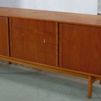 1970's teak veneer side board - cupboards to each end, four drawers to middle, original condition - Sold for $439 - 2013