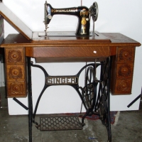 Carved Singer treadle sewing machine with 6 drawers carved In excellent condition - Sold for $244 - 2013