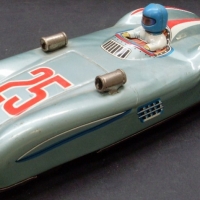 1950's Japanese Tin Toy RACING CAR - Mercedes Open wheeler, Grey w Red & White racing stripes, Number 25 w Driver - Battery Operated - 28cm L - Sold for $134 - 2013