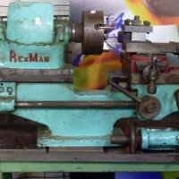 Australian Rexman Engineering metal lathe made in Richmond Victoria with 1 hp motor on stand with 2 self centering chucks High quality compact - Sold for $390 - 2013