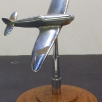 Chrome plated Spitfire model on stand with stepped silky oak base - Sold for $152 - 2013