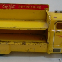 MARX TIN TOY advertising COCA-COLA TRUCK - yellow finish with red detailing and plastic wheels Approx 31cm L - Sold for $220 - 2013