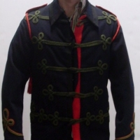 Dark blue military style jacket with green brocade and cloth toggles with red epaulets and matching pants - Sold for $171 - 2013