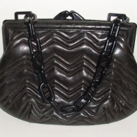 1920's black leather handbag by David Russell, London - quilted leather with black Bakelite chain handle, frame & fittings, red leather lining - Sold for $79 - 2013