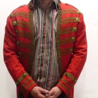 red velvet military style jacket with gold brocade and gilt English buttons and matching red pants - Sold for $244 - 2013