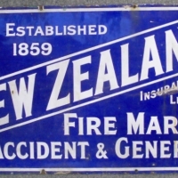 New Zealand Insurance Co. navy blue enamel advertising SIGN with white text & portrait of a male Maori - 46 x 76cms - good cond - Sold for $415 - 2013