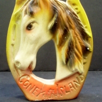 Novelty St Kilda souvenir chalkware figure - horse head in horse shoe  marked Coney Island St Kilda - Sold for $55 - 2013