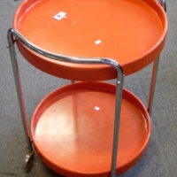 1970's orange plastic two-tier drinks trolley on casters VGC - Sold for $92 - 2013
