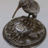 Kiwi Boot polish point of sale advertising paper weight of a Kiwi bird Silver plated on stand marked Kiwi Polish - Sold for $390 - 2013