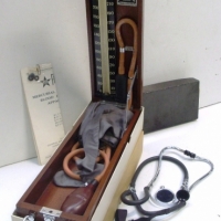 2 x MEDICAL ITEMS incl, British made Triple Change Stethoscope in original packaging & a vintage English made wooden cased Fivepoint Mercurial Blood P - Sold for $79 - 2013