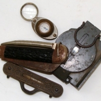 Group lot - vintage pocket knife & 2 x vintage compasses (one brass with magnifying loupe) and a Stanley line level patent 1896 in brass and cast iron - Sold for $61 - 2013