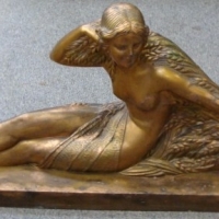 Large gilded Art Deco plaster ware figure - reclining nude with sheaths of wheat - Sold for $159 - 2013
