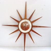 Teak Junghans Starburst retro wall clock - Sold for $390 - 2013