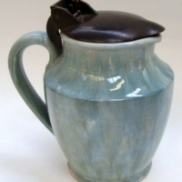 Australian pottery Electric  Jug in mottled Blue Glaze with Bakelite flip lid - Sold for $61 - 2013