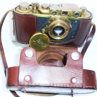 Brass LEICA Style Camera - with lens cap & in Leather case, all LEICA marks, serial No 257029 - Sold for $146 - 2013