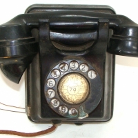 Black Bakelite wall mounted rotary dial telephone - Sold for $110 - 2013