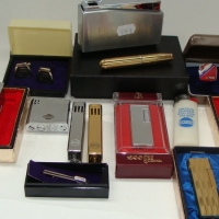 1970s Datsun promotional accessories inc. various lighters, cufflinks, tie clips - Sold for $293 - 2013