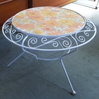 Retro round occasional table - white powder coated with floral design to top - Sold for $55 - 2013