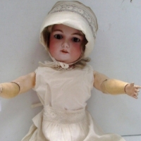 c 1900s German doll, jointed composition body BISQUE head, sleep glass eyes, open mouth teeth showing, hand painted detailing, pierced ears wi - Sold for $146 - 2013