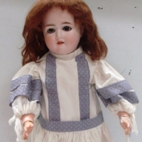 Early 1900's German SHOENUR & HOFFMEISTER doll, Jointed composition body BISQUE head with open mouth, teeth showing, sleep glass eyes & hand-p - Sold for $171 - 2013