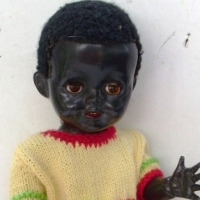 early 1950's hard plastic PEDIGREE black, 41cm Mandy Lou Walker doll, Sleep eyes, flock hair, open mouth with teeth showing Dressed in a vinta - Sold for $55 - 2013