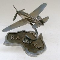 Chromed Trench art WW2 aeroplane on stand - P40 Tomahawk - map of Australia shaped base - Sold for $146 - 2013