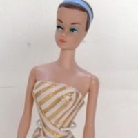 c1963 Fashion Queen BARBIE DOLL with protruding eyelashes, moulded head & three wigs Dressed in original white & gold swimsuit  with gold - Sold for $67 2014