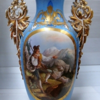Large Victorian porcelain Vase - heavily gilded, blue ground with large hand painted cameo featuring snow covered mountains, traveller res - Sold for $159 - 2014