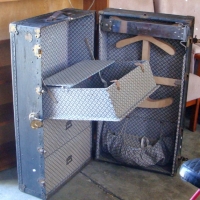 1920c Black metal banded PORTMANTEAU trunk fitted with drawers, hangers etc gc - Sold for $122 - 2014