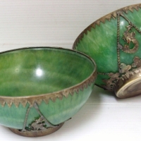 Pair oriental Jadeite bowls with metal filigree mount and dragon motif - approx 11cms diameter - Sold for $79 - 2014