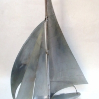 1950's Chrome plated model Yacht with billowing spinnaker - 34cms H - Sold for $61 - 2014