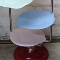 Bakelite 4 tiered Plate Stand - chrome frame, pastel coloured tiers with burgundy base & handle, approx 77cms tall - Sold for $244 2014