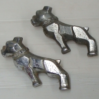 Pair of Mack Truck cast metal bulldog ornaments both left hand side - Sold for $55 - 2014