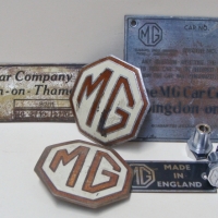 Collection of 8 x MG Car badges and plates from cars - Sold for $92 - 2014