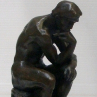 Small cast BRONZE reproduction of an AUGUST RODIN sculpture - THE THINKER - bears signature, on marble pedestal - approx 19cm h - Sold for $183 - 2014