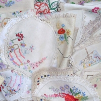 Box lot  vintage Linen cloths, doyleys, etc all with stunning embroidery - Sold for $183 - 2014