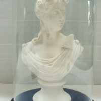 c1900 PARIAN bust of lady with flowers in her hair and a butterfly on her shoulder, on stand under glass dome - Sold for $85 - 2014