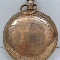 Elgin Railways Railroad pocket watch in Gold plated full hunter case with engraving of a train - Movement Marked Elgin III  National Watch Co  - Sold for $79