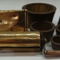 3 x  vintage brass items inc - 5 piece scale weight set, Robur Tea matchbox case and The Climax cigarette roller - Sold for $37