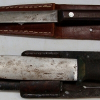 2 x sheath knives including hand made bowie style knife with leather handle and brass pommel - Sold for $98