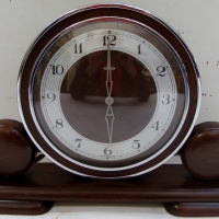 Art Deco Metamec mantle clock on wooden stand with Bakelite case - Sold for $49