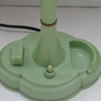 1930's pale green Bakelite lamp base with molded matchbox holder and ashtray combination - Sold for $79 2014