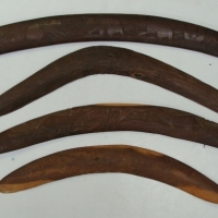 Group lot Aboriginal mulga wood carved boomerangs, with Kangaroo and emu carved in relief circa 1950s - Sold for $171 2014