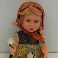 Vintage GOEBEL rubber doll with marks to neck and GOEBEL necklace plus clothing and socks - Sold for $37